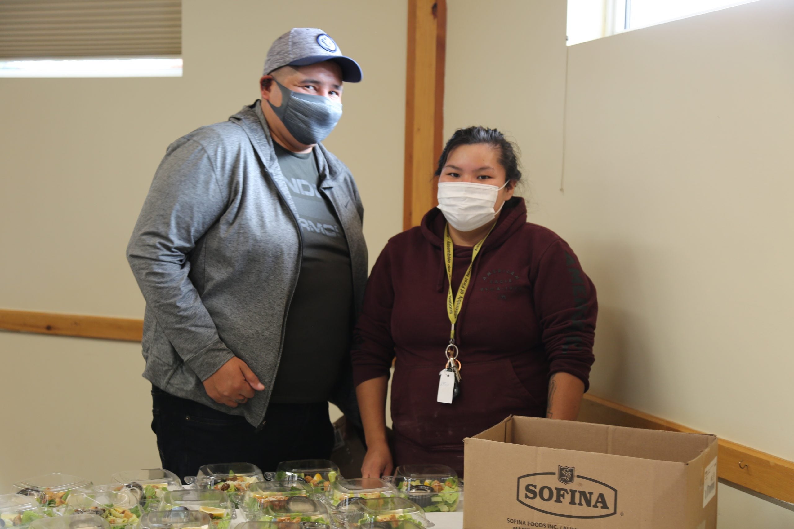 Caterers wearing masks.