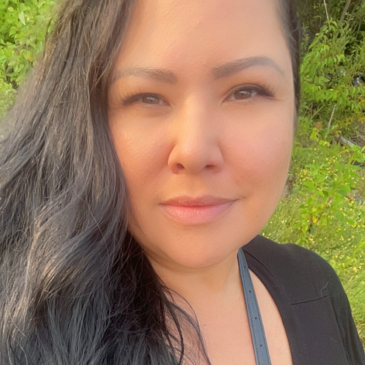 Natalie Daniels, Process Coordinator for Niiwin Wendaanimok, smiling in a professional headshot